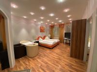 A bed or beds in a room at Ferienappartement Auerhahn