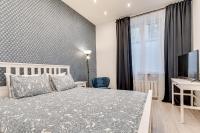 Posteľ alebo postele v izbe v ubytovaní KATO Apartamenty Centrum