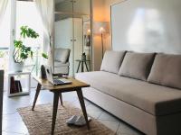 A seating area at Stefanias sunny Acropolis Studio on Drakou pedestrian