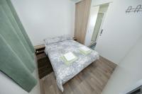 Posteľ alebo postele v izbe v ubytovaní Mobile home Smaragd