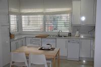 Kuchyň nebo kuchyňský kout v ubytování Apartamento Iris