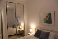 Postel nebo postele na pokoji v ubytování Apartamento Iris