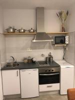 Kuchyň nebo kuchyňský kout v ubytování LA OLMA apartamentos