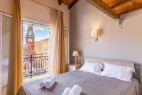 Posteľ alebo postele v izbe v ubytovaní Venetian era - Doukades center loft apt