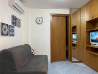 A television and/or entertainment centre at a casa mia holiday rental