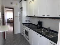 Kuchyňa alebo kuchynka v ubytovaní COSTA DAURADA APARTAMENTS - San Remo