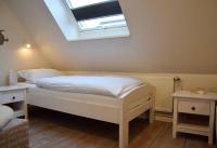 Postel nebo postele na pokoji v ubytování Haus Triton