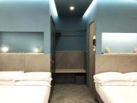 Posteľ alebo postele v izbe v ubytovaní Ottaviano Smart Rooms