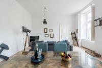Televízia a/alebo spoločenská miestnosť v ubytovaní Pal Loft in central Budapest