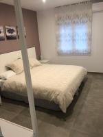 Postel nebo postele na pokoji v ubytování LA OLMA apartamentos