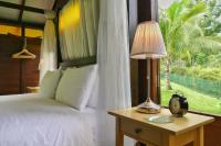 Villa Kelapa Langkawiにあるベッド