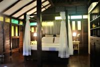 Villa Kelapa Langkawiにあるベッド