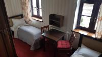 Postel nebo postele na pokoji v ubytování Hotelik & Restauracja Złota Kaczka