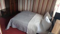 Postel nebo postele na pokoji v ubytování Hotelik & Restauracja Złota Kaczka