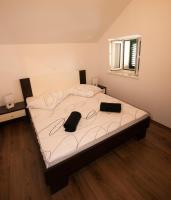 Posteľ alebo postele v izbe v ubytovaní Fokus seaview apartment