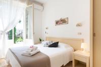 Łóżko lub łóżka w pokoju w obiekcie Hotel Verde Luna
