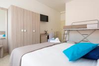 Łóżko lub łóżka w pokoju w obiekcie Hotel Verde Luna