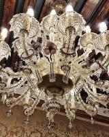a chandelier hanging from a ceiling in a room at Hotel Santa Chiara in Venice