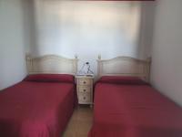 Posteľ alebo postele v izbe v ubytovaní Apartamentos Mediterraneo