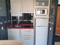Kuchyňa alebo kuchynka v ubytovaní Apartamentos Mediterraneo