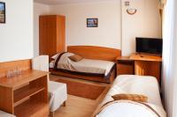 Posteľ alebo postele v izbe v ubytovaní Hotel Livia
