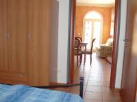Łóżko lub łóżka w pokoju w obiekcie Casa Amalia