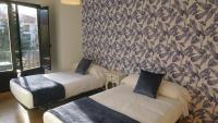 Posteľ alebo postele v izbe v ubytovaní Apartamentos Palacio Azcárate Calle Calvario