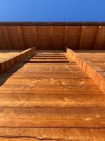an empty wooden stage with a blue sky in the background at Hotelski in Verbier