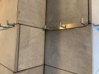 a wall with two metal plates on it at Hotelski in Verbier