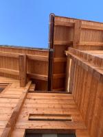 a view of the outside of a wooden building at Hotelski in Verbier