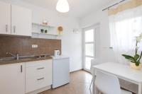 Kuchyňa alebo kuchynka v ubytovaní Apartments Laura