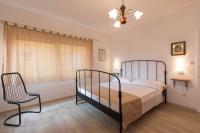 Postel nebo postele na pokoji v ubytování Apartments Morozin