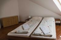 Postel nebo postele na pokoji v ubytování Penzion U Holuba