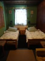 Postel nebo postele na pokoji v ubytování Guest House Leona