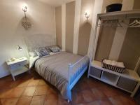 A bed or beds in a room at Spazioso appartamento con terrazza a due passi dal centro