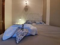 A bed or beds in a room at Spazioso appartamento con terrazza a due passi dal centro