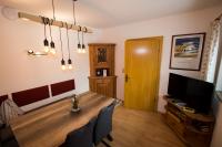 Telewizja i/lub zestaw kina domowego w obiekcie Appartementhaus Salzmann