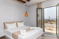 Posteľ alebo postele v izbe v ubytovaní Kallithea Hotel