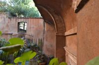 A garden outside Palazzo Velli Suites