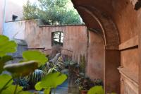 A garden outside Palazzo Velli Suites