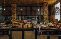 a buffet of fruits and vegetables on a table at Keemala in Kamala Beach