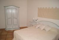 A bed or beds in a room at Case Della Marina
