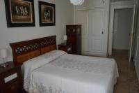A bed or beds in a room at APARTAMENTO SAN PEDRO PLAYA