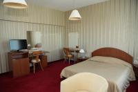 Postel nebo postele na pokoji v ubytování Hotel Perperikon