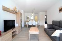 Televízia a/alebo spoločenská miestnosť v ubytovaní Rocamaura III BX-9 - planta baja