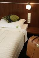 Posteľ alebo postele v izbe v ubytovaní Hotel Azyl