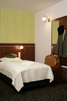 Posteľ alebo postele v izbe v ubytovaní Hotel Azyl