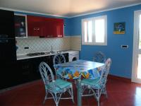 A kitchen or kitchenette at LENTISCHIO villetta vista mare a 250 metri dalla spiaggia con ARIA CONDIZIONATA