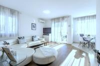 Televízia a/alebo spoločenská miestnosť v ubytovaní Iris beach apartments