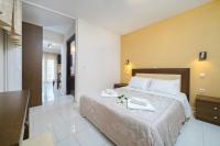 Postel nebo postele na pokoji v ubytování Ilias Apartments